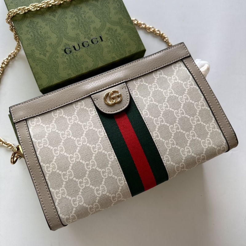 G*u*i clutch bags